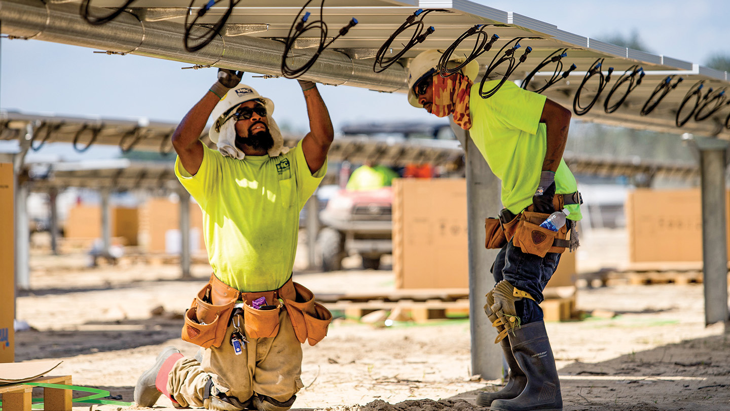 Workers install panels at a solar farm built by Cypress Creek Renewables in Laurinburg, North Carolina. The company has cancelled projects in 10 states since new tariffs were implemented. Workers install panels at a solar farm built by Cypress Creek Renewables in Laurinburg, North Carolina. The company has cancelled projects in 10 states since new tariffs were implemented.